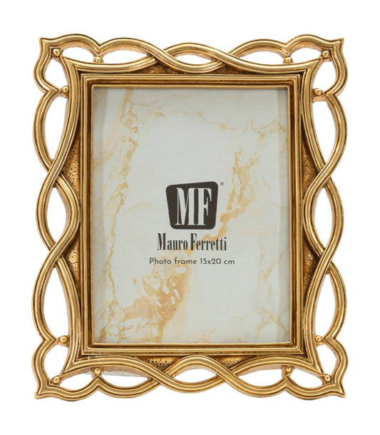 Fotocornice elegante Cornice Wave Mauro Ferretti in oro con misura interna 15x20 cm, ideale per arredare ambienti raffinati.