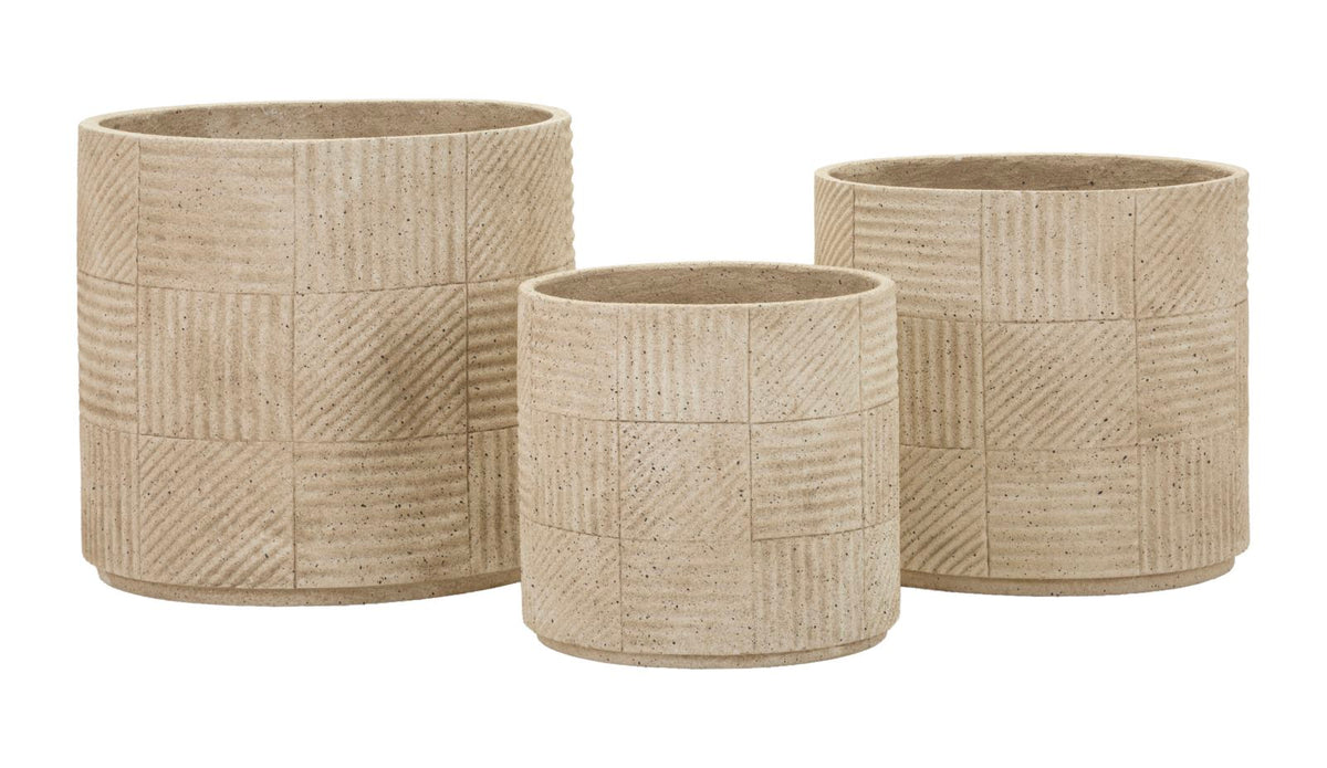 Set di tre cachepot da esterno Venezuela in pietra naturale con superfici incise e design raffinato, ideali per piante e decorazioni outdoor