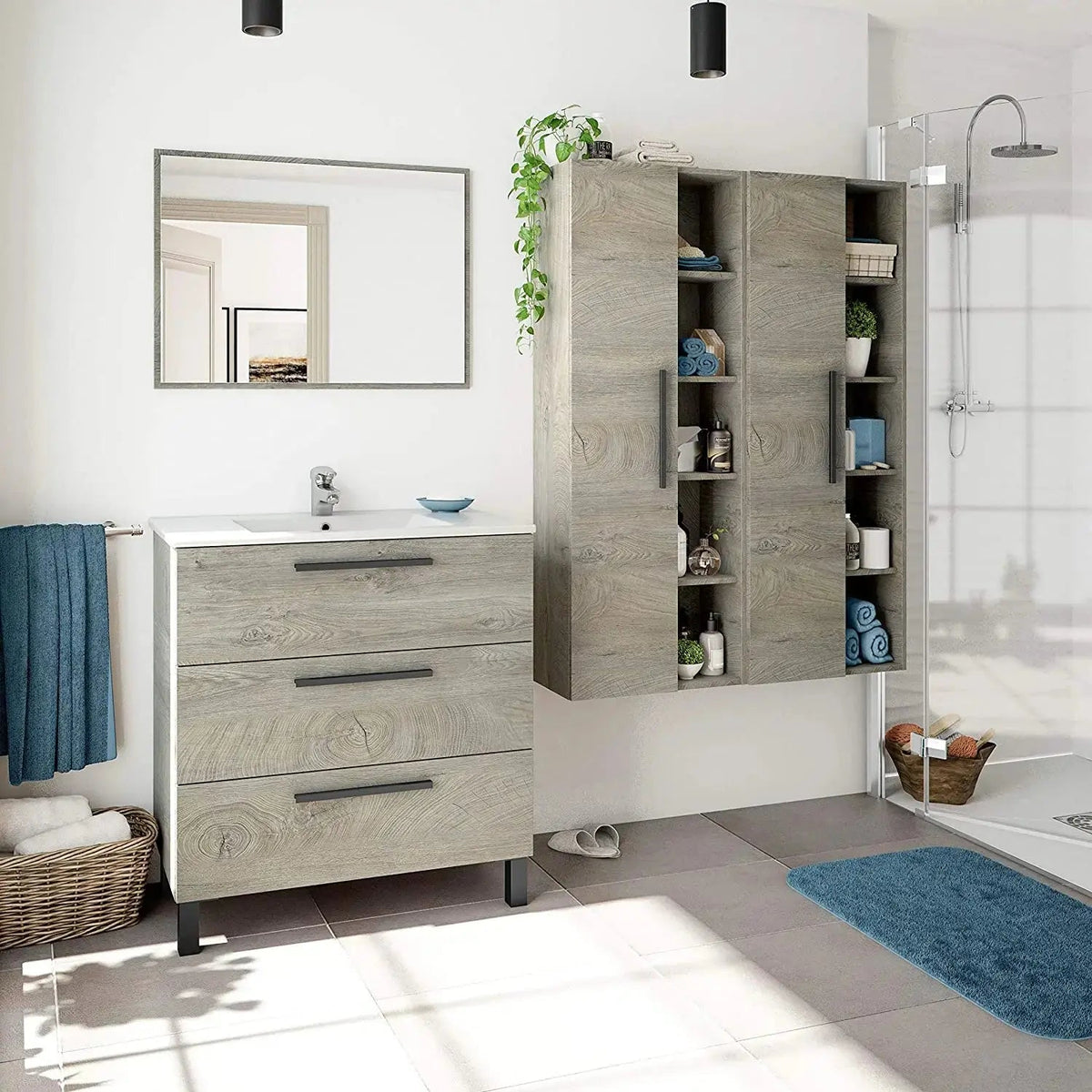 Set di mobili bagno in rovere Alaska con mobile 3 cassetti, specchio e pensili coordinati. Soluzione elegante e pratica per il bagno.