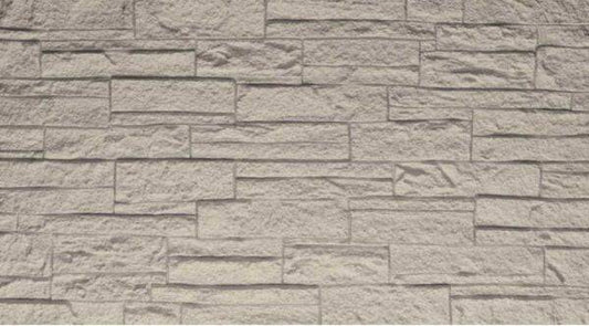 Pannello murale fonoassorbente in PU effetto pietra 3D in tonalità beige chiaro, superficie testurizzata con dettagli di pietra, perfetto per interni eleganti