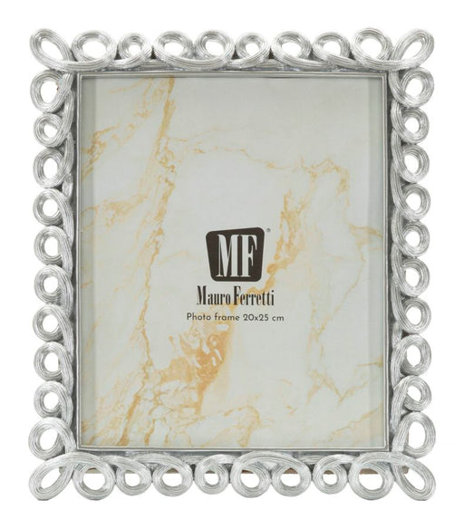 Fotocornice elegante Cornice Hollow Cm 26X2,2X31,3 con misura interna 20x25 cm, finitura argentata decorativa per arredamento raffinato.