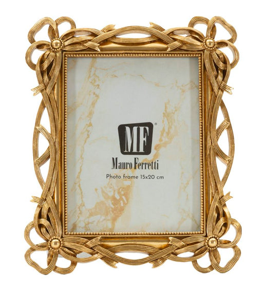 Cornice elegante dorata Mauro Ferretti modello Knot con misura interna 15x20 cm, stile classico per interni raffinati.