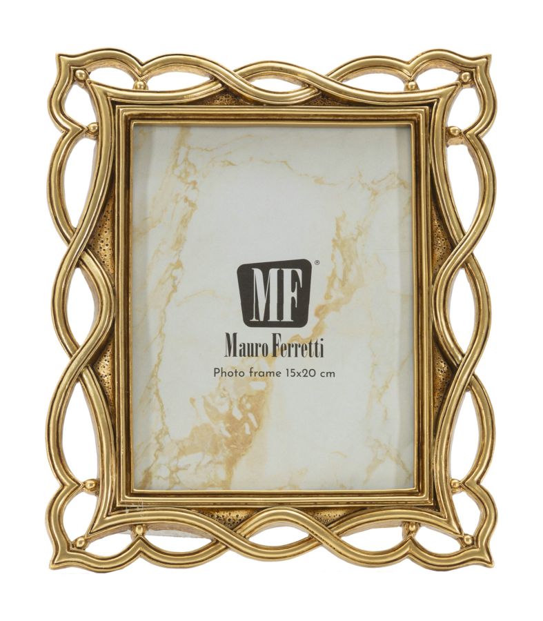 Fotocornice elegante Cornice Wave Mauro Ferretti in oro con misura interna 15x20 cm, ideale per arredare ambienti raffinati.