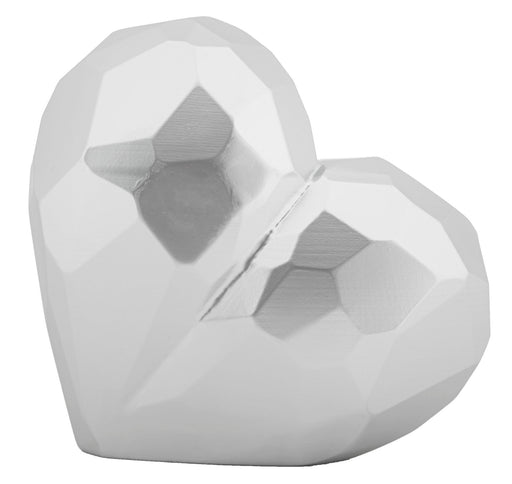Vaso Heart Silver Cm 19X9X18 Elegante e Moderno con finitura argentata opaca e design geometrico a forma di cuore, ideale per arredi contemporanei.