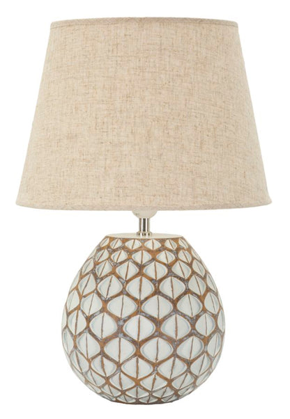Lampada da tavolo resina Tibet Ø 35X52 con base decorata a rilievo e paralume in tessuto beige, design elegante per interni moderni.