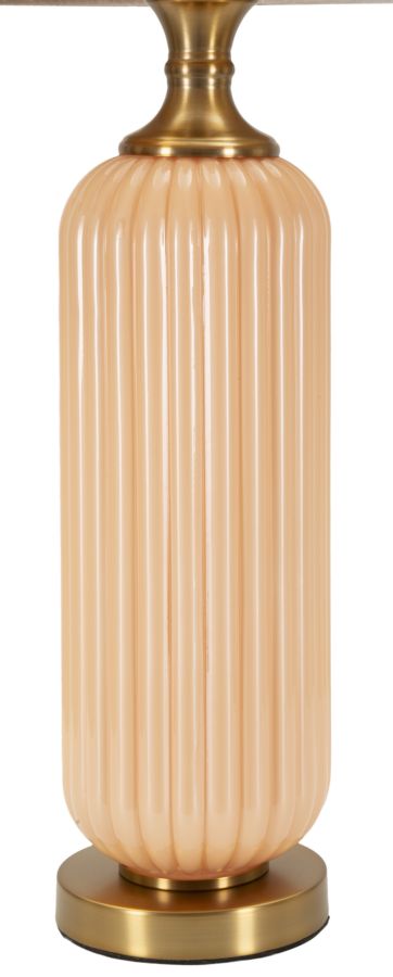 Dettaglio della base cilindrica in vetro scanalato color pesca della lampada da tavolo Perly -C-, stile raffinato e contemporaneo.
