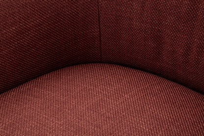 Dettaglio interno della seduta della Poltrona Girevole Siena Bordeaux, comfort e tessuto resistente.