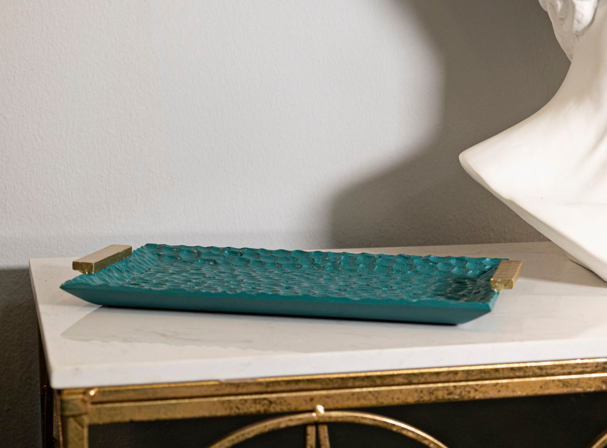 Svuotatasche Grent posizionato su mobile elegante, perfetto per chiavi e accessori in ambienti di design.
