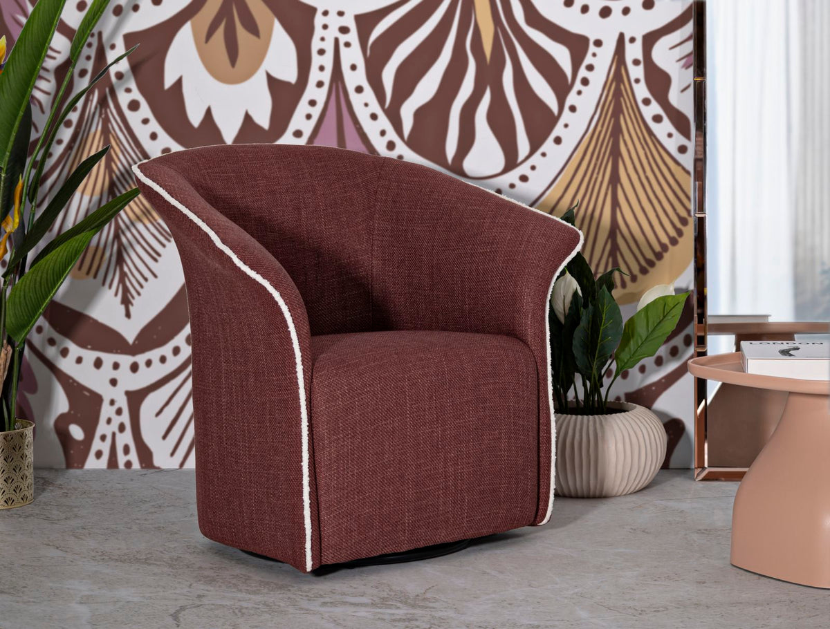 Poltrona Girevole Siena Bordeaux in soggiorno moderno con decorazioni floreali, perfetta per ambienti eleganti.