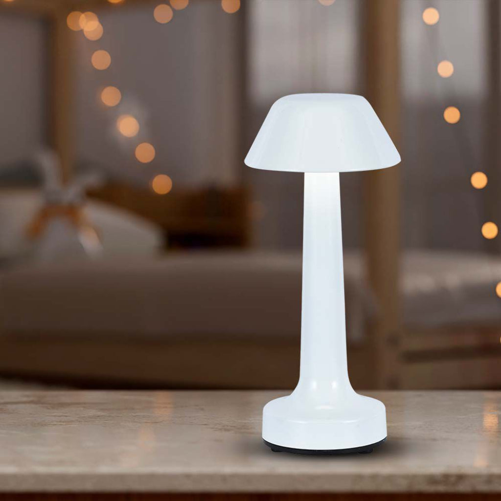 Lampada da tavolo LED V-Tac bianca con luce soffusa, perfetta per creare atmosfera in camera da letto o soggiorno.