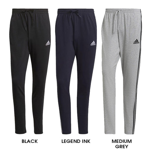 Pantaloni sportivi Adidas in tessuto jersey nero con logo bianco, elasticizzati con girovita regolabile, ideali per allenamento e casual
