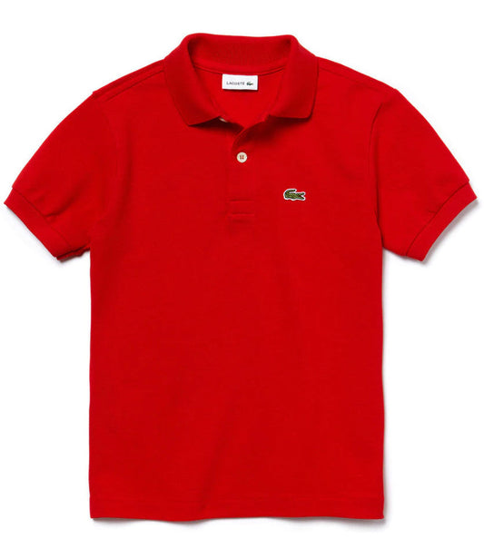 Polo Lacoste bambino in piqué di cotone rosso con colletto a polo, maniche corte e ricamo del coccodrillo verde sul petto, taglia 11 anni.
