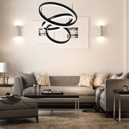 Immagine del lampadario LED sospensione a cerchi neri e bianchi, installato in soggiorno elegante, SKU: 213990