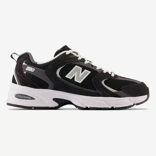 Scarpe sportive uomo New Balance MR530CC nere con tomaia in mesh e dettagli in tessuto, suola in gomma bianca, supporto ABZORB, SKU: 0196432921959