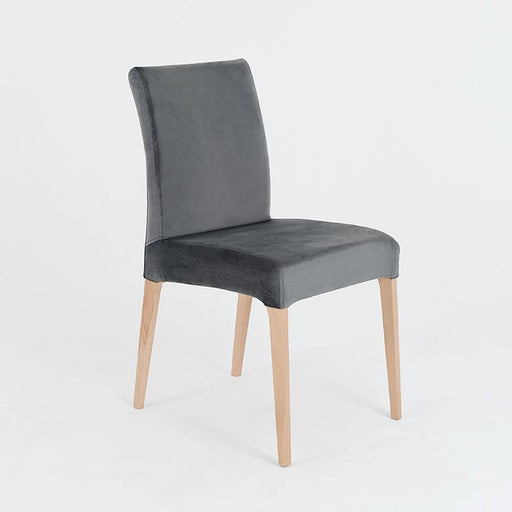 Sedia design Diana in velluto grigio lilla con gambe in legno chiaro, imbottitura confortevole, ideale per sala da pranzo o soggiorno.