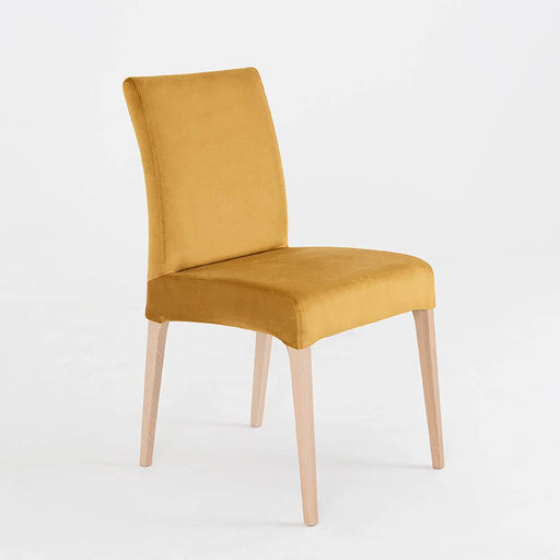 Sedia design Diana in velluto giallo senape, struttura in legno chiaro, elegante e versatile, ideale per soggiorno o sala da pranzo.