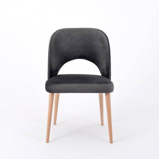 Sedia BUKO grigia con seduta e schienale in velluto nero, gambe in legno chiaro, stile moderno e confortevole per ambienti domestici