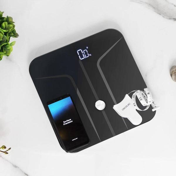 Cecotec Surface Precision 9750 Smart Healthy Bilancia Pesapersone fino a 180kg - Bluetooth 4.0 - Piedini Antiscivolo - Funzione Bambino - Vetro Temperato - 4 Sensori - Metro da Sarto - 300x300mm - Colore Nero