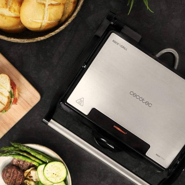 Cecotec Rock'nGrill 1500 Rapid Piastra Grill Elettrica - Potenza 1500W - Rivestimento Antiaderente - Vassoio Raccogli Grasso - Piastra Superiore Regolabile - 24.5x17.3cm - Acciaio Inossidabile