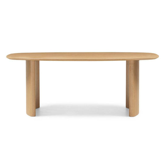 Tavolo da pranzo ovale in rovere naturale con gambe robuste in legno, superficie liscia e design elegante, ideale per ambienti moderni
