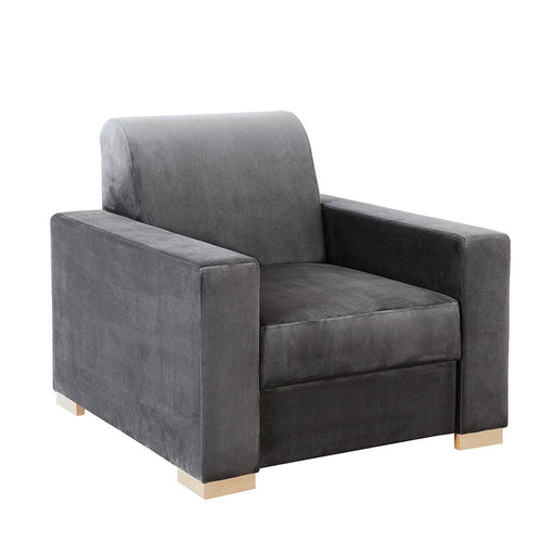 Poltrona stabile in velluto grigio con braccioli larghi e schienale alto, piedi in legno chiaro, ideale per soggiorno elegante e moderno