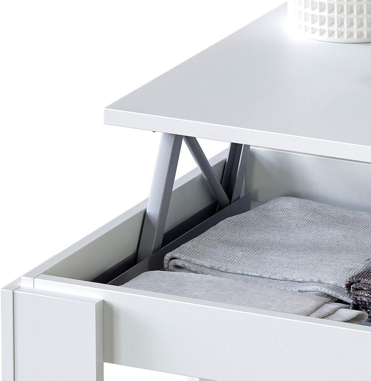 Dettaglio del vano interno del tavolinetto Bianco Artik con spazio per riporre oggetti. Design pratico e raffinato.