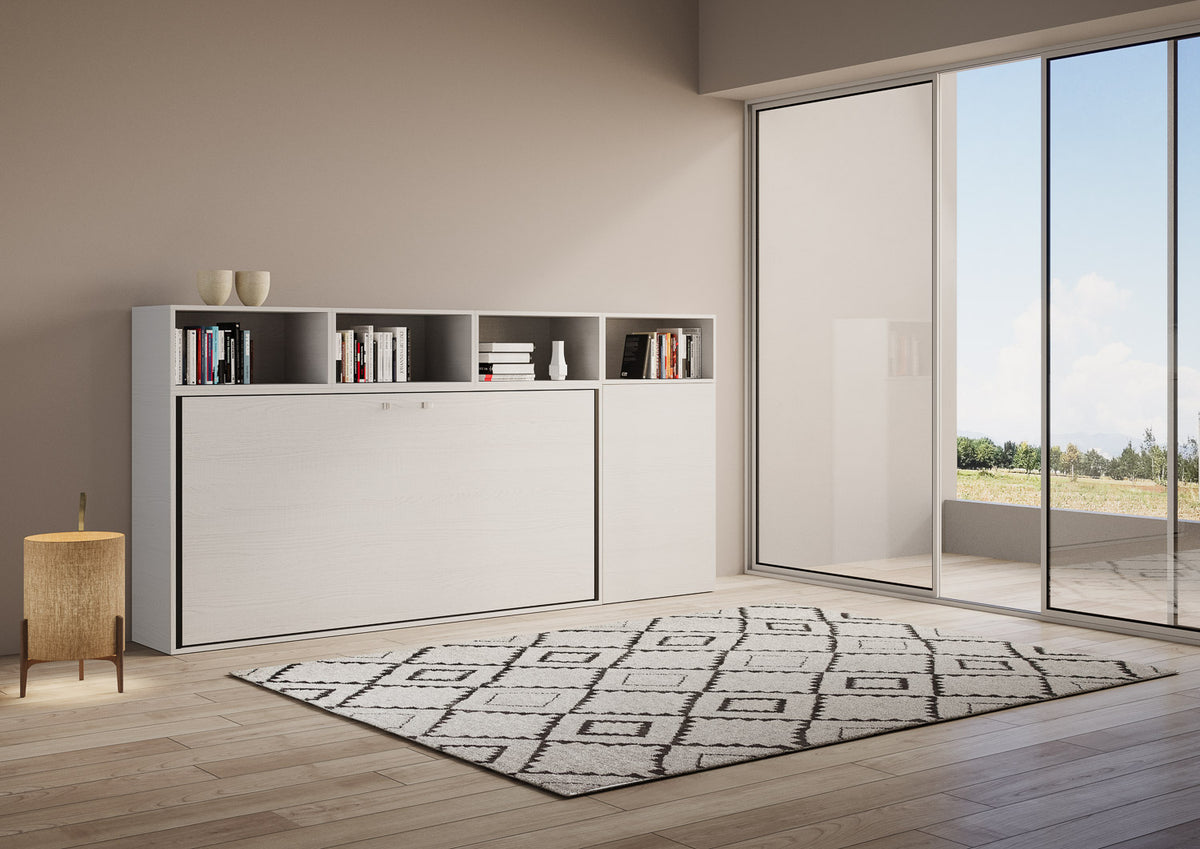 Vista laterale del mobile letto Kando chiuso, con libreria superiore e finitura chiara, perfetto per ambienti luminosi e moderni.
