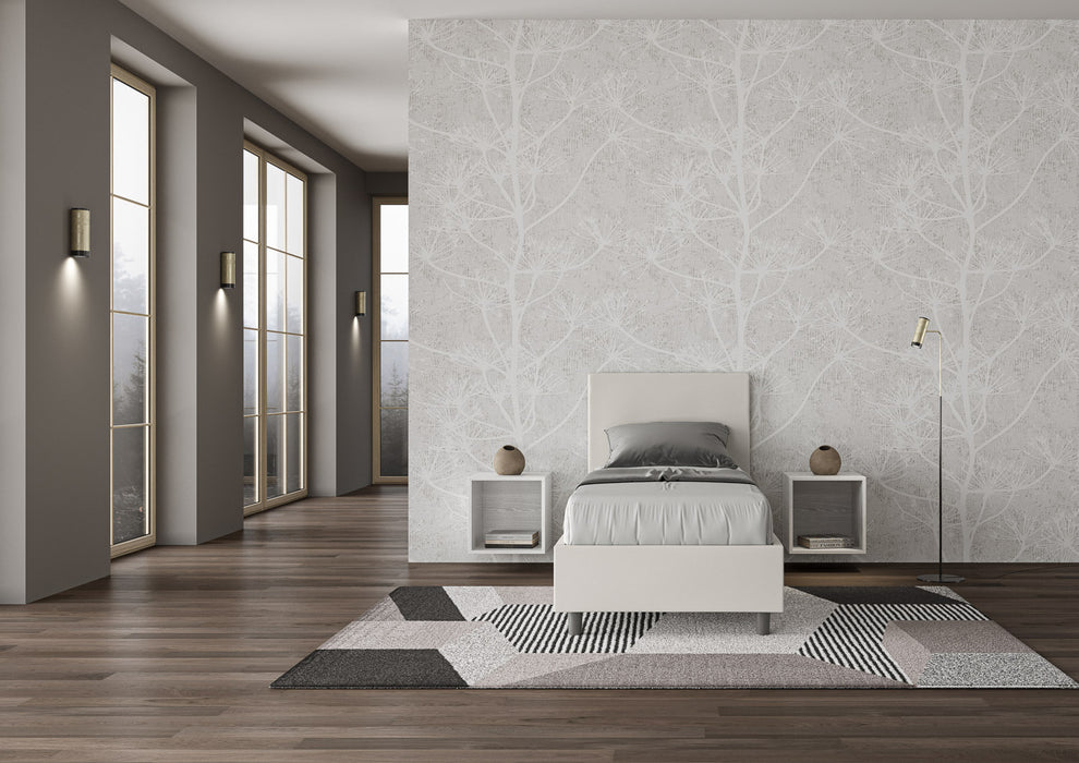 Letto singolo imbottito Adele bianco in similpelle 80x190 cm, perfetto per ambienti luminosi e arredamenti contemporanei.