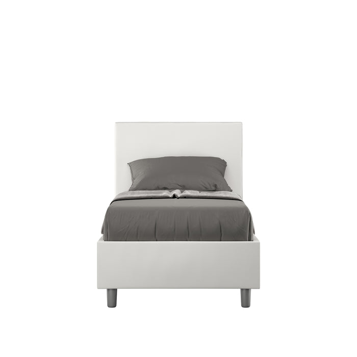 Letto singolo imbottito similpelle Adele bianco senza rete, con testiera alta e design moderno, ideale per camere minimaliste.