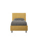 Letto singolo imbottito 80x210 microfibra Adele giallo ocra, senza rete. Struttura moderna con testata imbottita e piedini grigi.