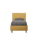 Letto singolo contenitore imbottito 90x200 microfibra Adele giallo senape, con testata alta e piedini grigi. Stile vivace per camere moderne.