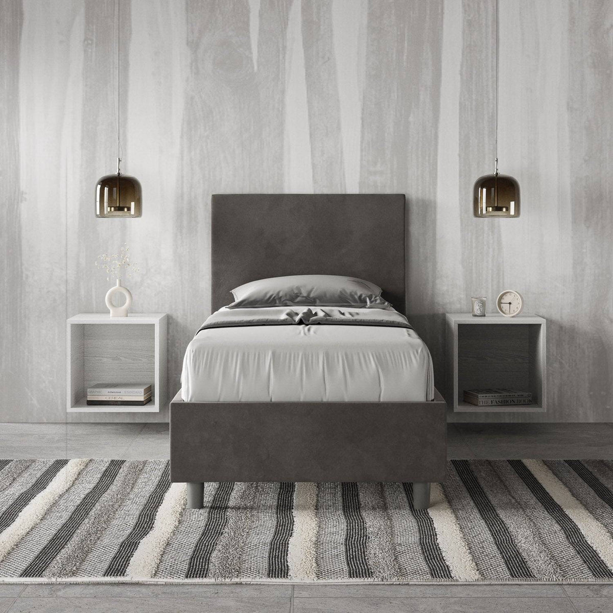 Letto singolo contenitore Adele in microfibra grigio scuro, inserito in camera moderna con comodini sospesi