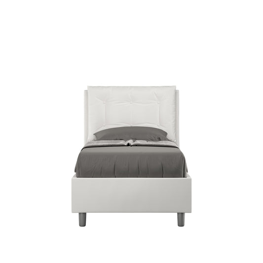 Letto singolo imbottito similpelle Annalisa bianco con testata trapuntata e giroletto imbottito, senza rete, ideale per camere moderne.