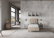 Camera moderna con letto singolo Annalisa beige in similpelle, testata trapuntata e arredamento minimalista.