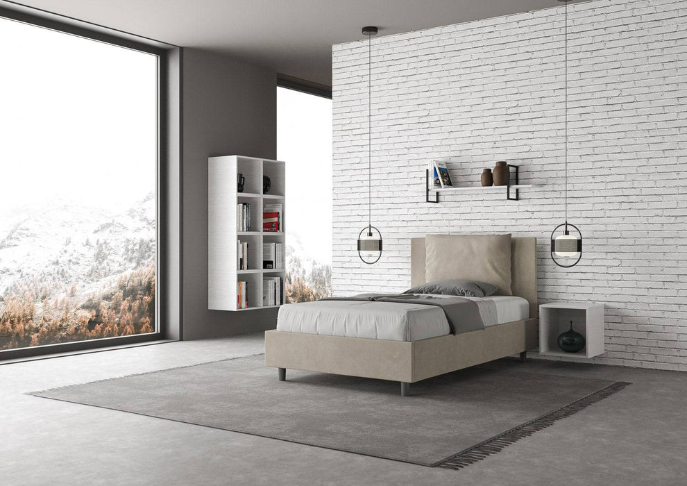 Letto singolo Antea 100x200 beige con contenitore, ideale per arredare camere moderne con vista panoramica e design pulito.