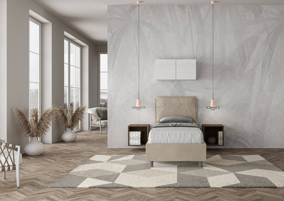 Letto singolo contenitore imbottito 90x210 microfibra Antea beige, inserito in una stanza luminosa e accogliente.