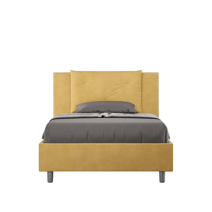 Letto singolo contenitore imbottito Appia 100x210 in microfibra giallo senape, con testiera elegante e struttura moderna.