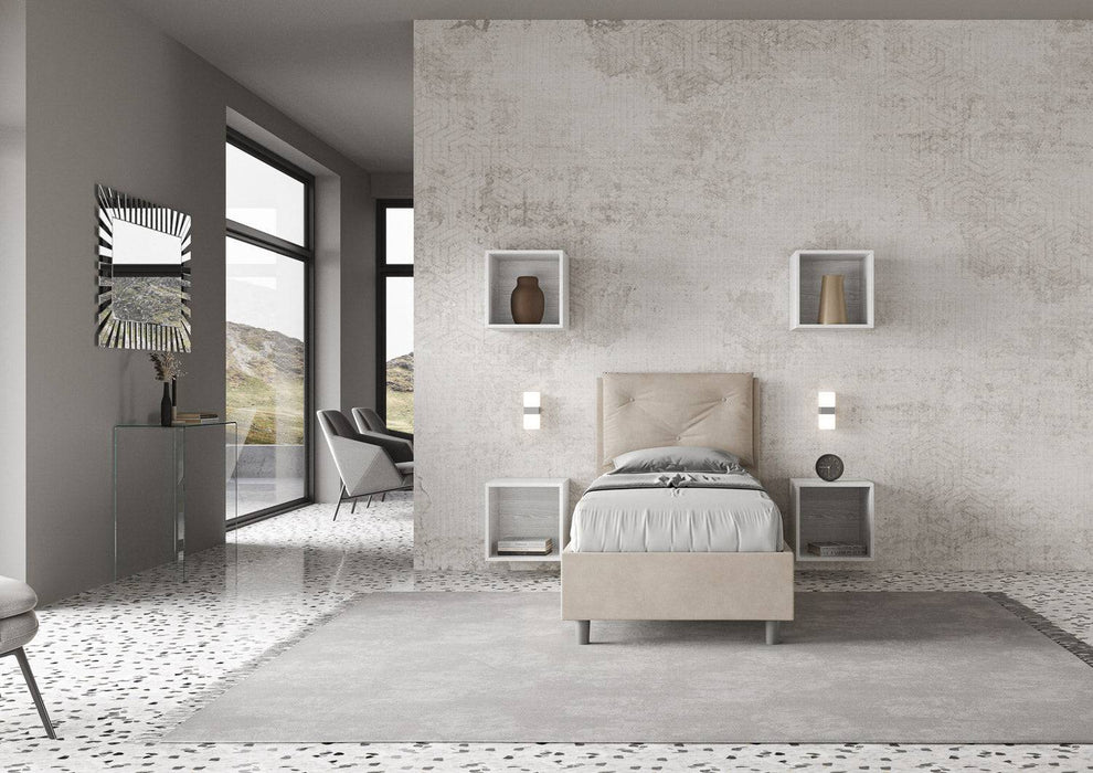 Letto singolo contenitore Appia beige 90x190, inserito in una camera dal design contemporaneo e luminoso.