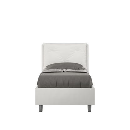 Letto singolo imbottito similpelle Appia bianco senza rete, testata trapuntata e giroletto moderno, ideale per camere minimaliste