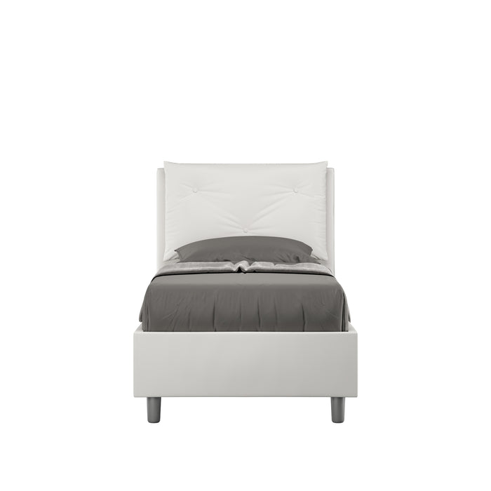 Letto singolo imbottito similpelle Appia bianco senza rete, testata trapuntata e giroletto moderno, ideale per camere minimaliste