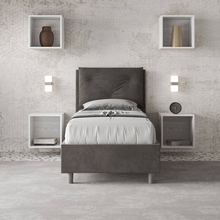 Letto singolo 80x200 Appia imbottito grigio scuro con testiera trapuntata, rete e contenitore integrato, design moderno.