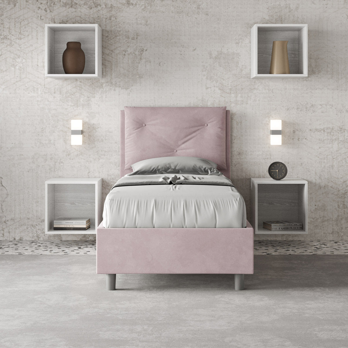Letto singolo Appia rosa cipria in microfibra con testata imbottita, inserito in una camera moderna con parete decorativa e nicchie a muro.