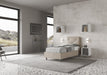 Letto singolo Appia beige tortora 80x190 con struttura imbottita, inserito in una camera moderna con vista panoramica e arredi minimal.