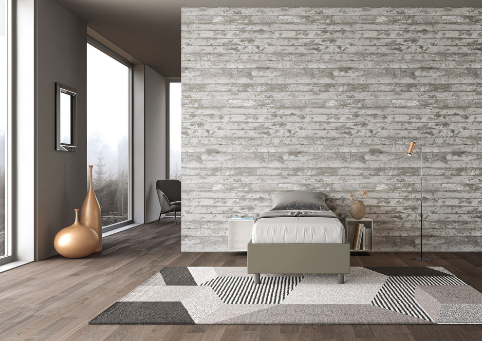 Letto singolo Azelia grigio oliva in similpelle, ideale per arredare camere dallo stile industriale e contemporaneo.