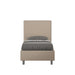 Letto singolo imbottito Focus beige in similpelle con testiera verticale, perfetto per arredare camere eleganti e moderne.