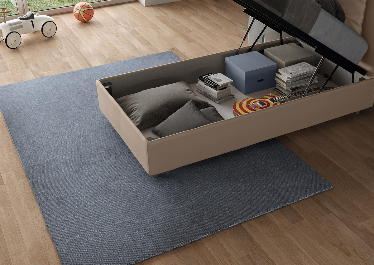 Contenitore sottoletto del letto singolo Annalisa beige in similpelle, pratico per riporre cuscini e accessori.