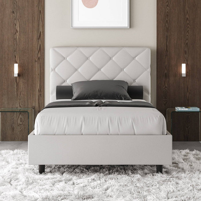 Letto singolo Priya bianco in similpelle con contenitore, perfetto per camere eleganti e ordinate.
