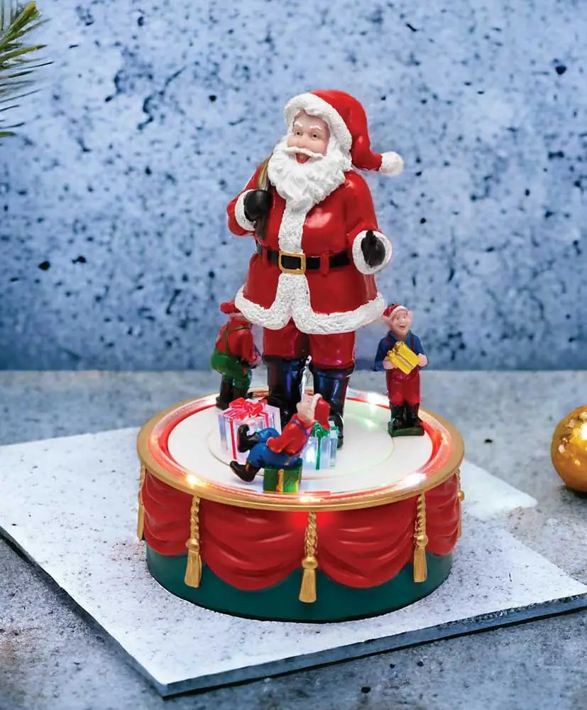Babbo Natale rotante con elfi e musica RGB, decorazione natalizia in resina rossa e bianca con dettagli realistici, perfetta per addobbi festivi