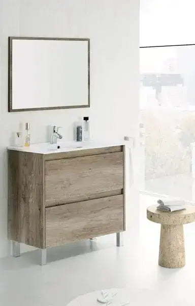 Mobile bagno in rovere nordico 80x46x80 cm con due cassetti spaziosi, lavello in ceramica e specchio rettangolare. Design scandinavo elegante per arredamento bagno moderno.
