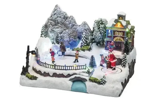 Paesaggio natalizio con pattinatori e babbo natale in movimento con led e musica Ornamenti natalizi LOTTI   